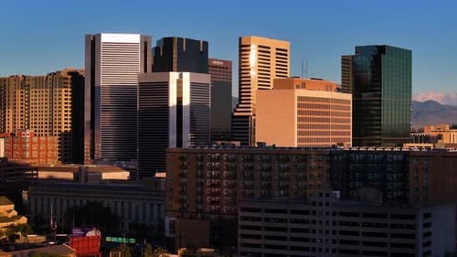 Aerial view of Denver skyline with mountains, United States.