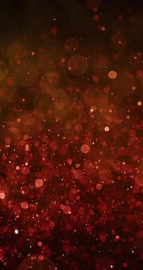 Luminous Yellow And Orange Particles With Bokeh Effects