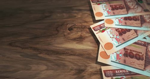 Guatemala quetzal money banknotes background loop