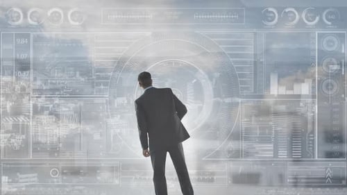 Animation of businessman looking at screen data processing over cityscape