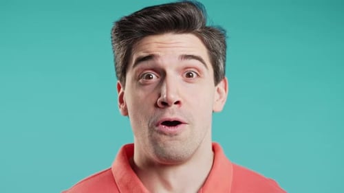 Man Reacts with Joy and Surprise Close Up