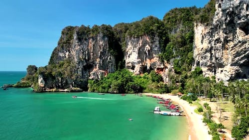 Tropical Island Paradise with turquoise water and boats