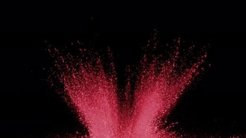 Red Powder Exploding on Black Background in Super , With