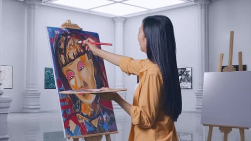 Female Looking At The Picture On Canvas Then Saying Wow While Painting In Gallery