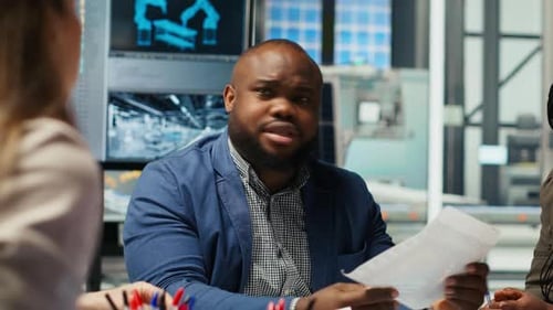 Factory Engineers Look at Assembly Lines Designs Working to Increase Output