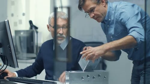 Two Senior Engineers Discuss Important Technical Component. Both are Experienced and Wise. Their Of