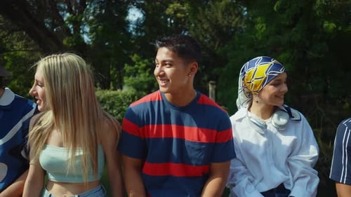 Diverse Group of Young Friends Enjoying Sunny Day Chat