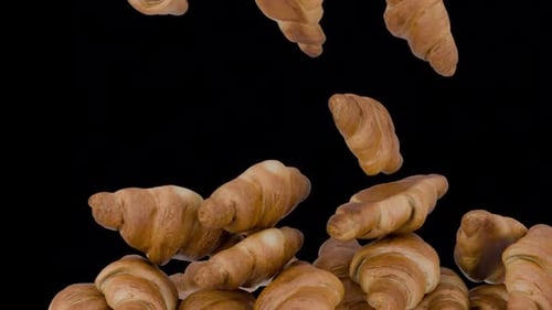 Golden Croissants Falling Food Transition Background