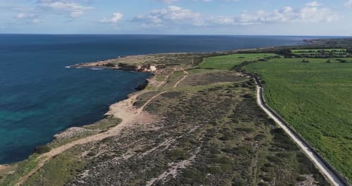 Aerial view of the coastline and fields, Italy.