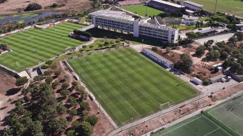 Aerial Video Top View of Three Stadiums Outdoor Soccer Game Green Field with Markings