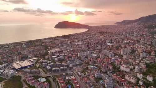 Aerial View Turkish City Under Spell of Sunset Pink Clouds Cast Enchanting Glow