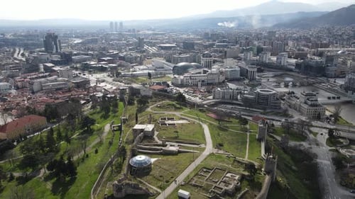 Drone view castle in the center of Skopje is among the buildings, stone castle in the city center
