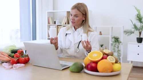 Dietitian with Laptop Showing Healthy Food Choices