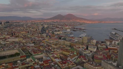 Aerial Panoramic View of Urban Boroughs Around City Harbour and Majestic Vesuvius Volcano in