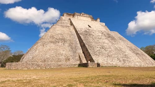 Mayan pyramid ( Ruta Puuc ) during the day, Time Lapse with the Sun and Clouds, Yucatan, Mexico.
