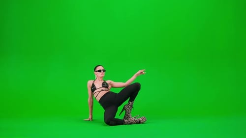 Attractive Female Dancing on the Floor Dynamic Dance in High Heels on Chroma Key Green Screen