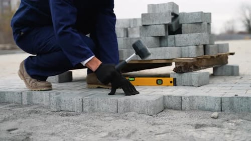 Paver Installation on a Gray Urban Landscape