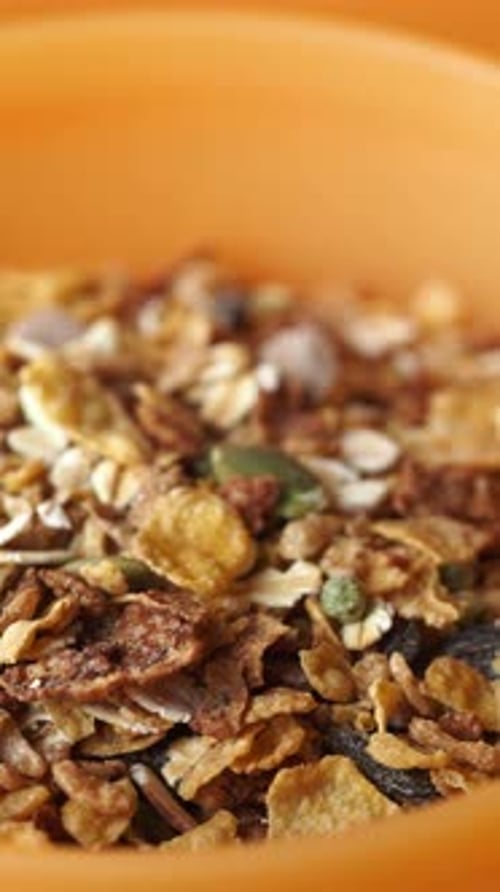 Crunchy Granola Mix in Bright Bowl for Healthy Snacking