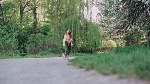 Woman Walking the Dog