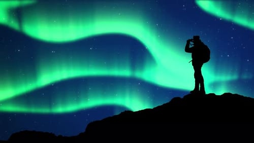 Aurora Borealis Landscape, Green Northern Lights and man silhouette on the hill.