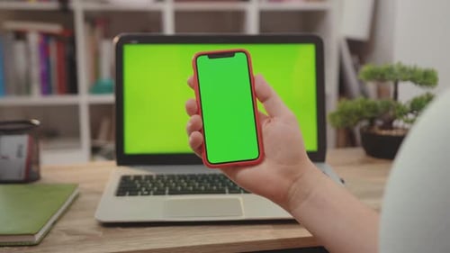 NEW YORK April 5 2019 Young Hands Man Use Laptop Computer with Green Screen Chroma Key Display