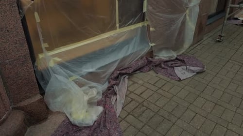 The Construction Area is Thoroughly Covered and Secured with a Variety of Protective Wrapping and