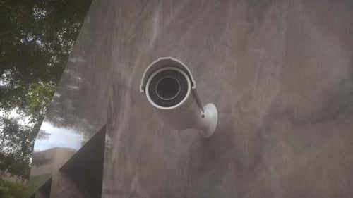 Sleek Security Camera Lens Retracts and Infrared Lights Activate