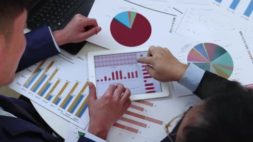 Financial Manager Analyzing Annual Financial Statements Of Listed Company