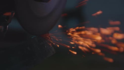 Metal Grinding Wheel Creating Bright Orange Sparks