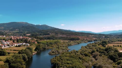 Aerial view of a river on a valley between the mountains in Portugal, Europe