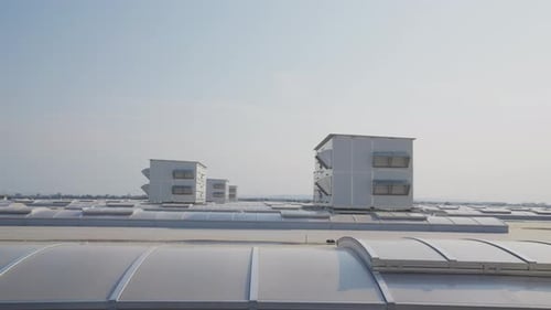 Roof with rows of skylights and units
