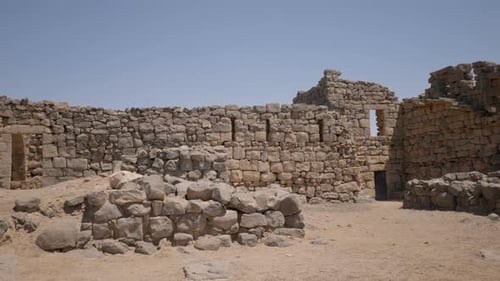 Ancient Stone Ruins Under a Clear Blue Sky