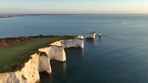 Aerial view of Old Harrys Rocks with Sandbanks and Bournemouth in the distance.