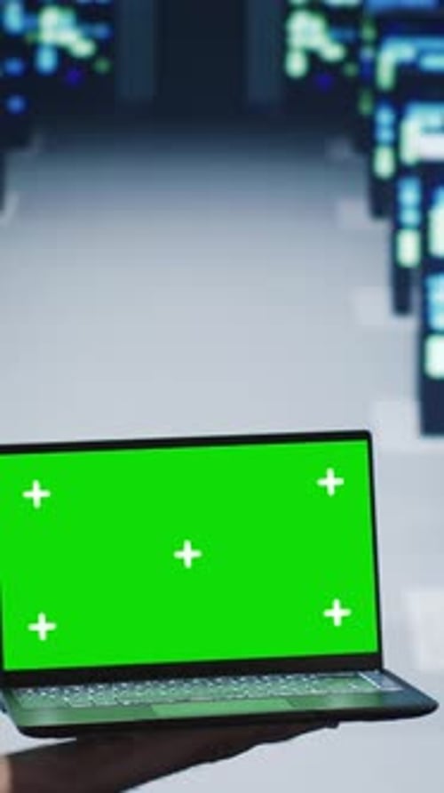 Laptop with Green Screen in Server Room