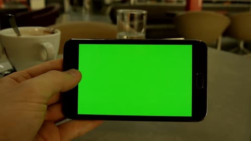 Smart Phone Display Isolated on Green Screen Background