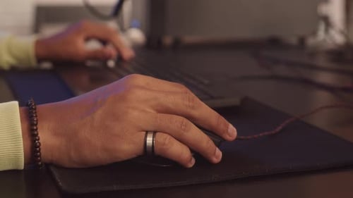 Hands of PC Gamer Using Keyboard and Mouse