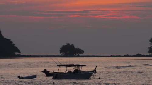 Boats on Water during Orange Sunset