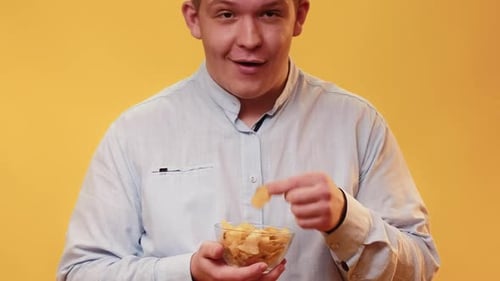 Food Lover Eating Chips Overweight Man Crisps