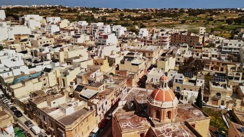 Malta's vibrant urban landscape showcases classic architecture and greenery