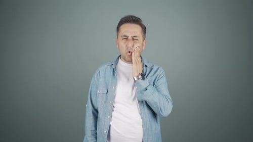 Man with toothache.