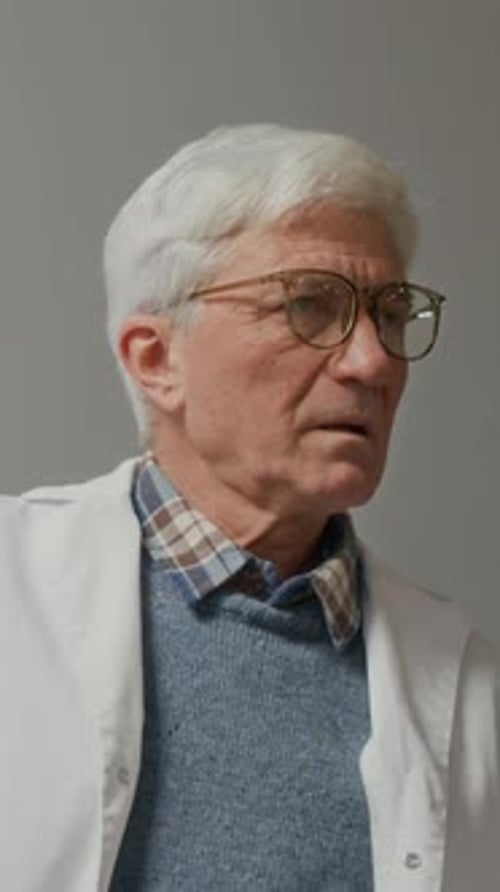 Senior Male Professor of Medicine Talking during Lecture Class at College