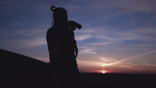 Photographer Silhouette at Sunset
