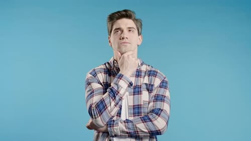 Thinking Around Man on Blue Background Smart Student 30s Guy Finding Answer