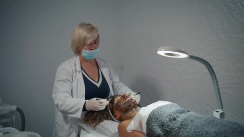 Doctor Apply Skincare Mask for Anti Aging Peeling Facial Rejuvenation Procedure