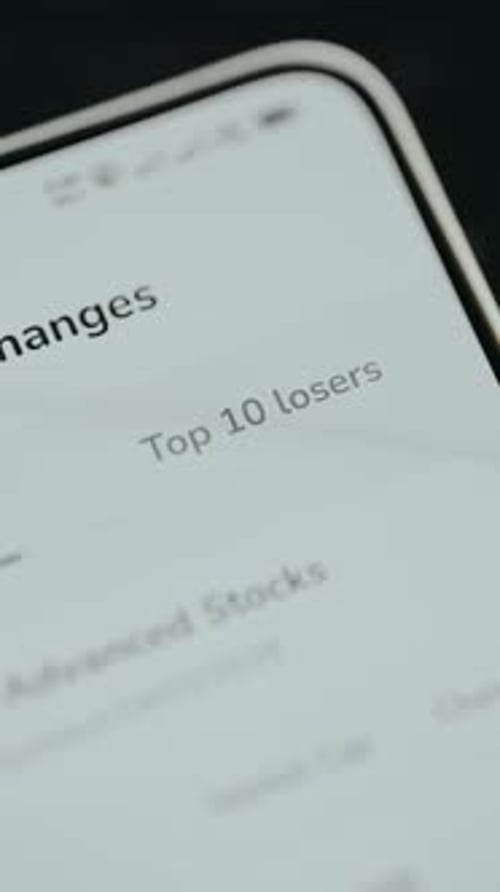 Person Selects the Top 10 Losers Category