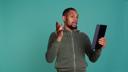Man Speaking During Tablet Video Call