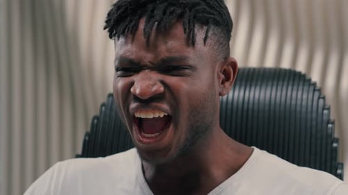 Man Yelling in Frustration
