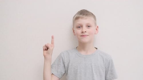 Child Poses and Points Upward