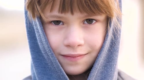 Close Up Portrait of a Boy in Hoodie