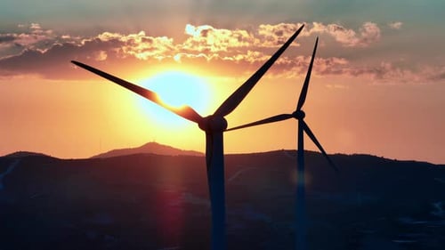 Aerial View of Alternative Electricity Production By Windmills at Sunset